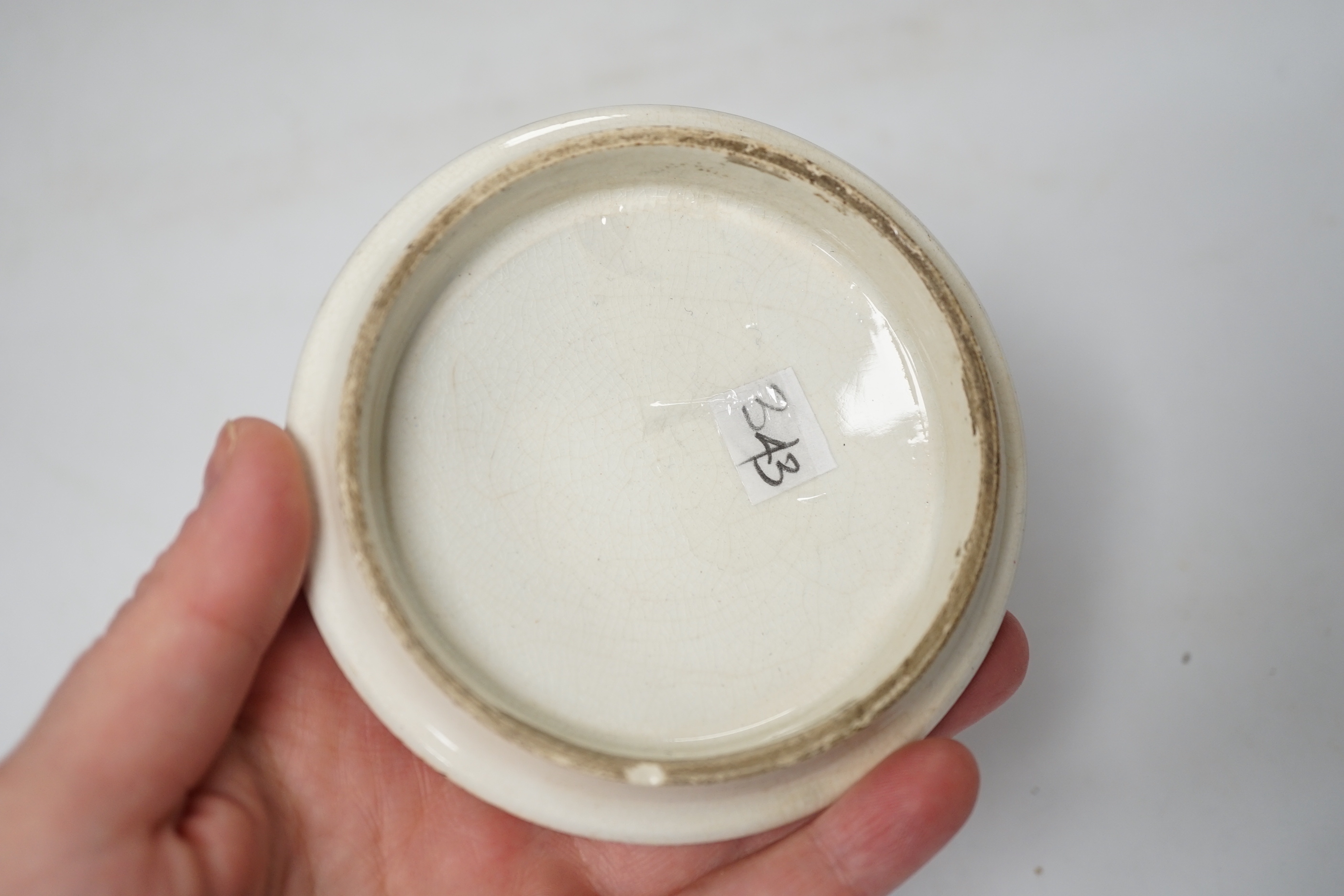 Nine Victorian ceramic Prattware pot lids and one base